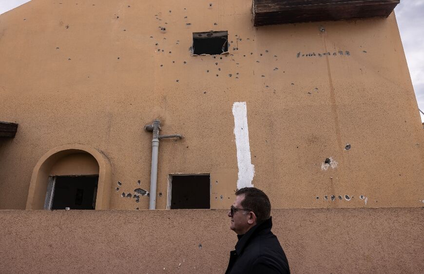 Some walls in the town are still riddled with bullet holes from the Hamas attack