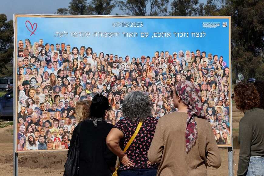 Visitors arriving now in a nearby parking lot are met with a giant mosaic of photos of victims killed in the attack 