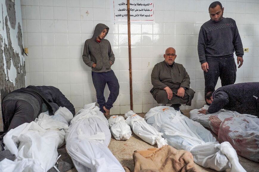 Palestinians at the al-Aqsa hospital in central Gaza's Deir el-Balah mourn loved ones killed during Israeli bombardment on March 6, 2024