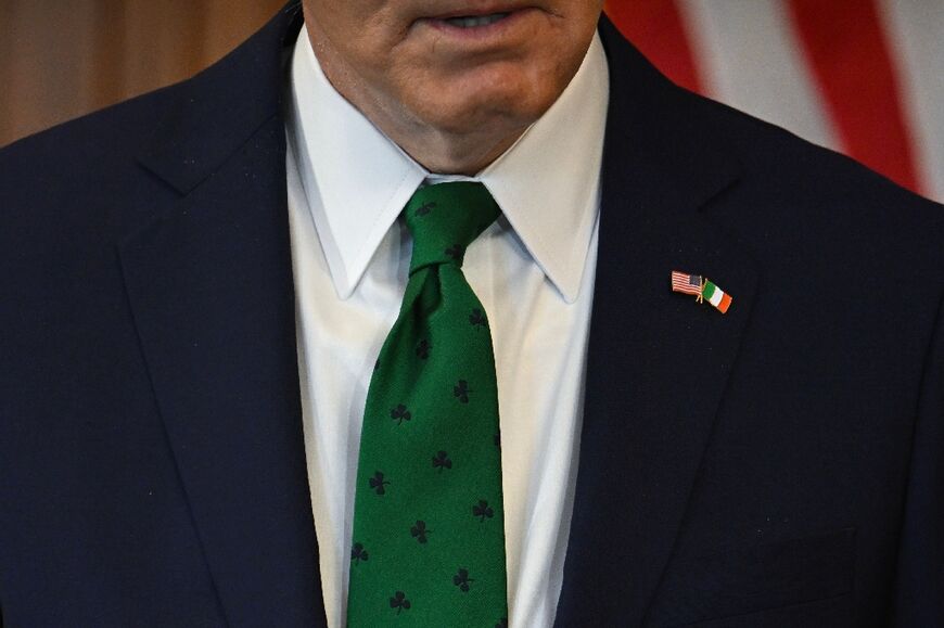 US President Joe Biden, wearing a Shamrock-themed tie, speaks at the annual Friends of Ireland luncheon, hosting Irish Taoiseach Leo Varadkar in Washington on March 15, 2024