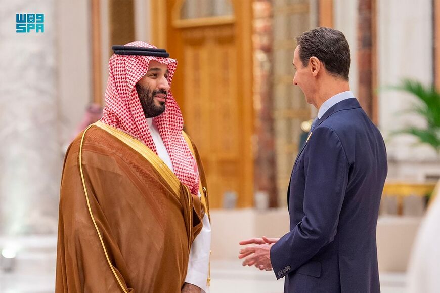 Saudi Crown Prince Mohammed bin Salman (L) speaks with Syrian President Bashar al-Assad, an Iran ally, at an Arab League summit on the Gaza war in Riyadh in November