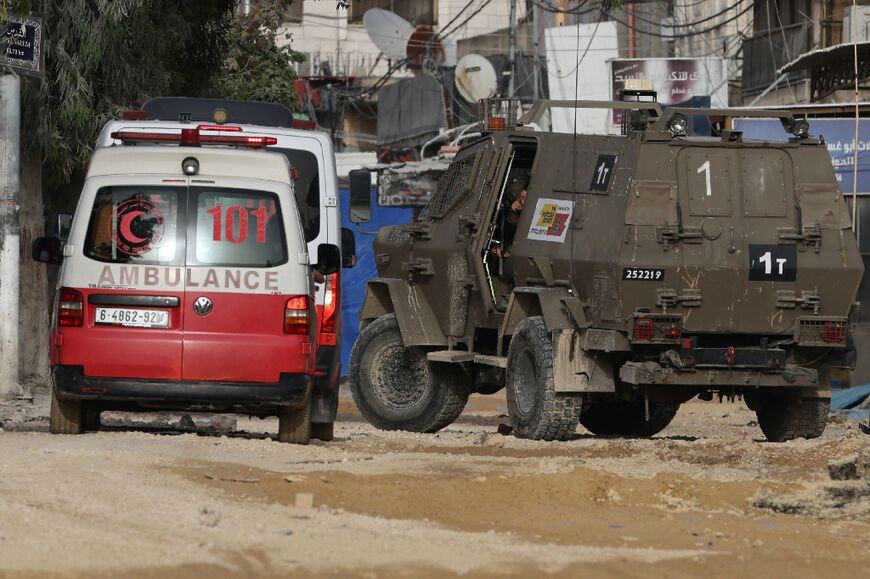 Israeli soldiers block ambulances trying to reach the wounded during a 40-hour raid on Nur Shams refugee camp in the occupied West Bank