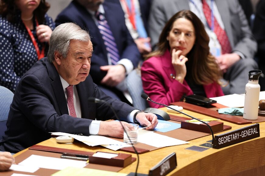 United Nations Secretary-General Antonio Guterres (L) delivers opening remarks during a UN Security Council meeting on the situation in the Middle East, including Iran's recent attack against Israel, on April 14, 2024