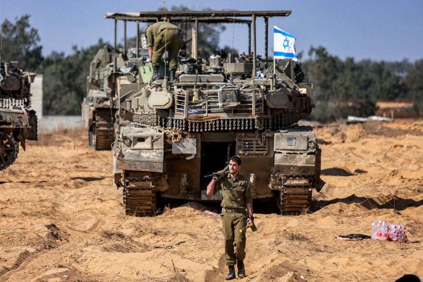 Israeli troops near the Gaza border, almost seven months since the Hamas attack that sparked the war