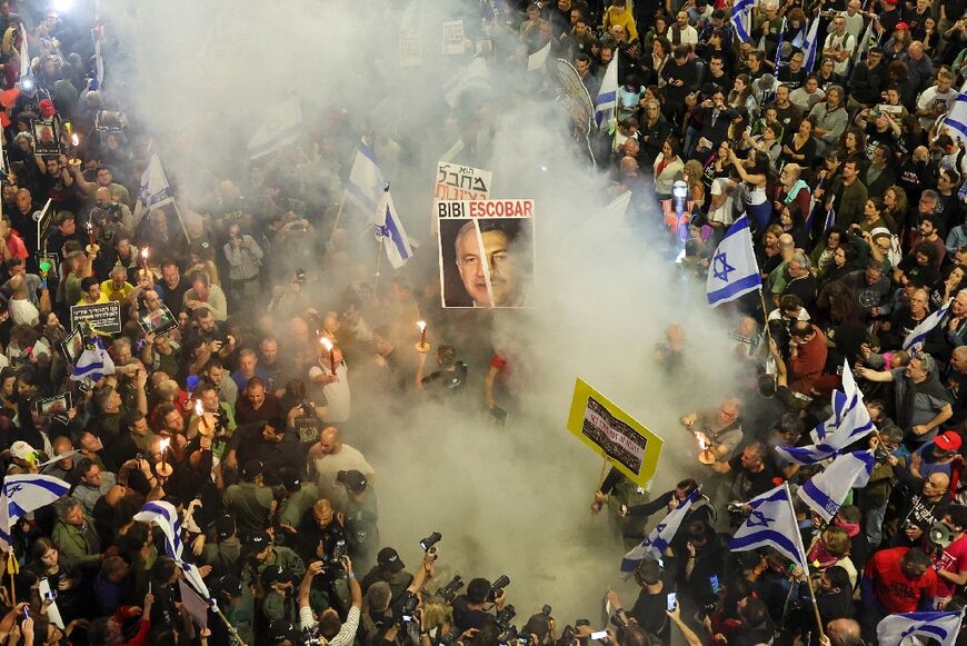 Tens of thousands of Israelis protested, including in Tel Aviv, demanding 'elections now' -- they were joined by families and supporters of hostages held by militants in Gaza
