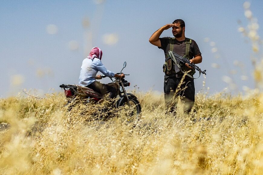 Volunteers help the semi-autonomous Kurdish-led region protect the fields from fires and arsonists