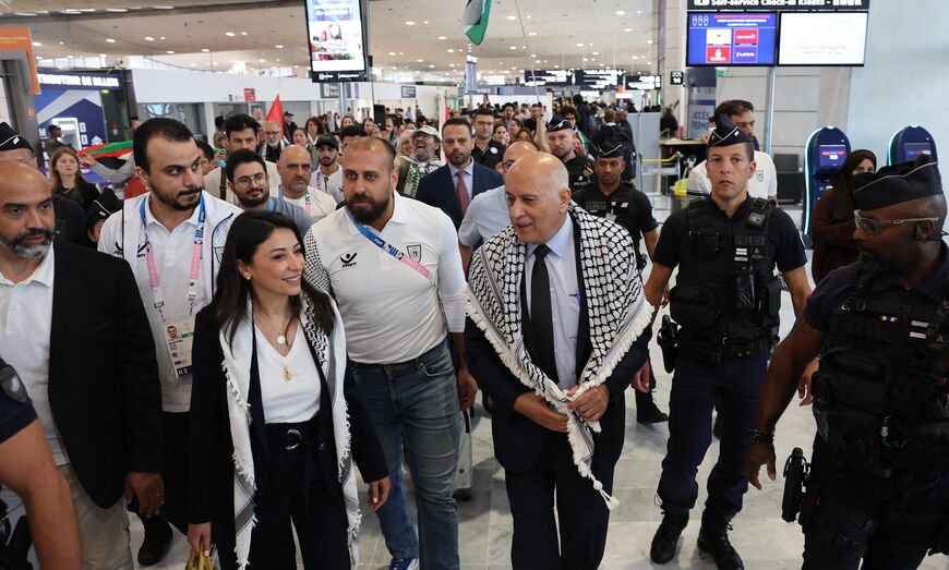 Jibril Rajoub, president of the Palestinian Football Association and the Palestine Olympic Committee, Palestinian Olympic athletes and members of the delegation arrive at Charles-de-Gaulle airport in Roissy-en-France, north of Paris, on July 25, 2024.