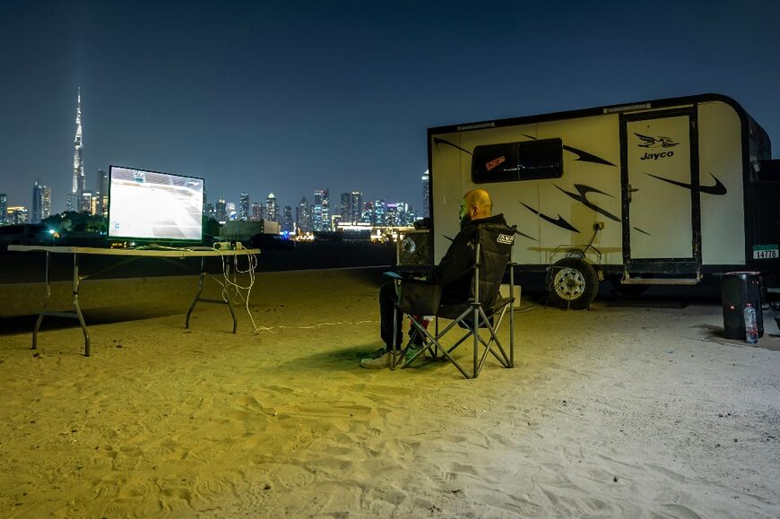 Dubai campers watch football under the stars