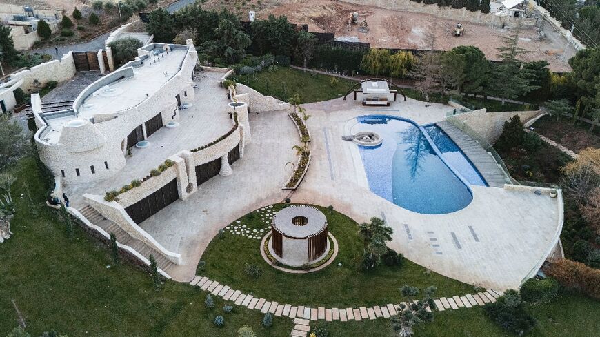 Ill-gotten gains: Maher al-Assad's villa is built into a hillside in a Damascus suburb 