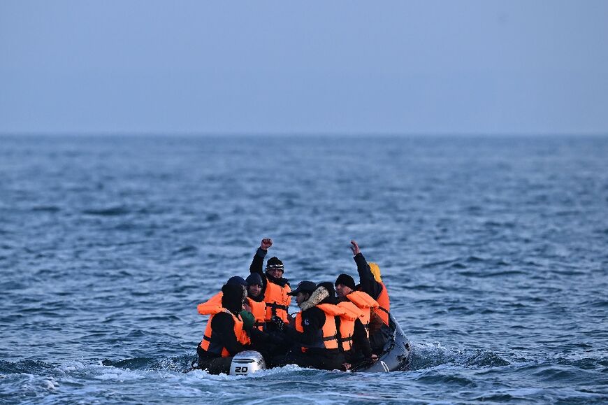 Would-be asylum seekers cross the Channel in an inflatable dinghy