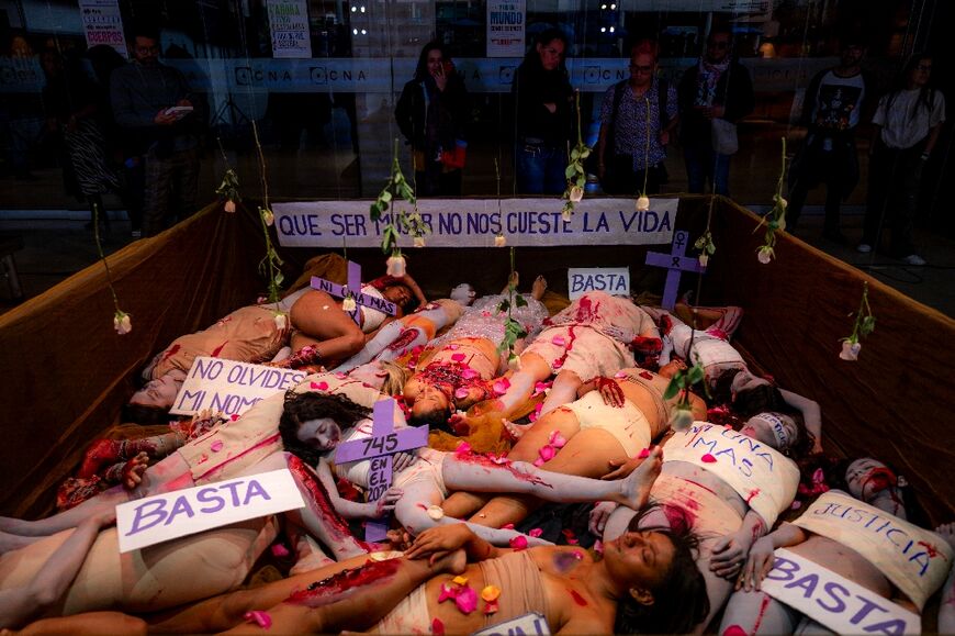 In Bogota, women from the Palma de Vino collective performed an art installation entitled 'Being a woman should not cost us our lives'