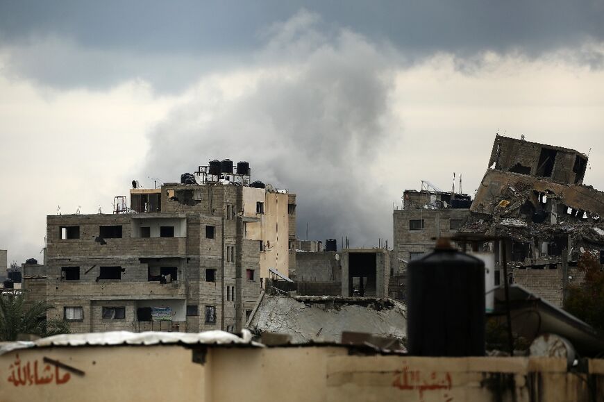 Smoke billows after an Israeli strike near the Bureij refugee camp in the central Gaza Strip 