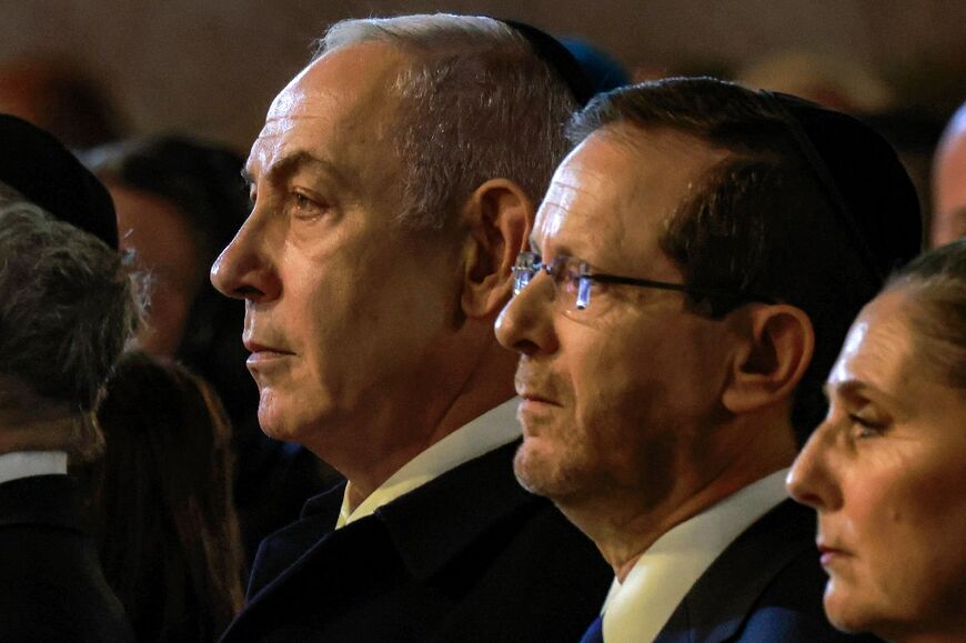 Israel's President Isaac Herzog and Prime Minister Benjamin Netanyahu attend a ceremony marking Yom HaShoah, Holocaust Remembrance Day