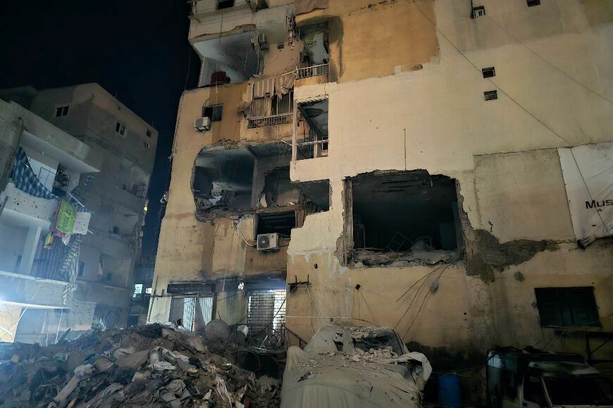 Damage following an Israeli strike in the southern Lebanese city of Tyre on March 22, 2025, during the most intense escalation since a ceasefire in the Israel-Hezbollah war