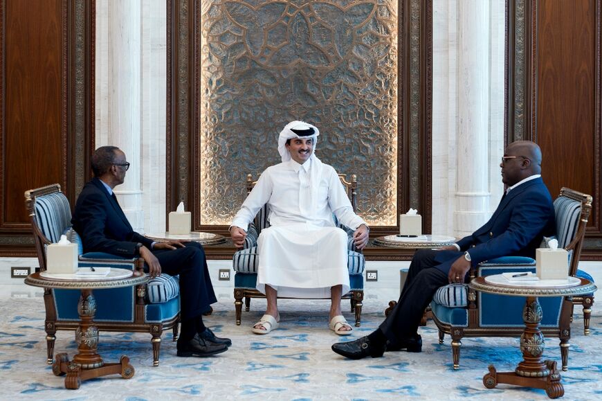 Qatar's Emir Sheikh Tamim bin Hamad Al Thani (C) meeting with Rwandan leader Paul Kagame (L) and DRC President Felix Tshisekedi in Doha on March 18