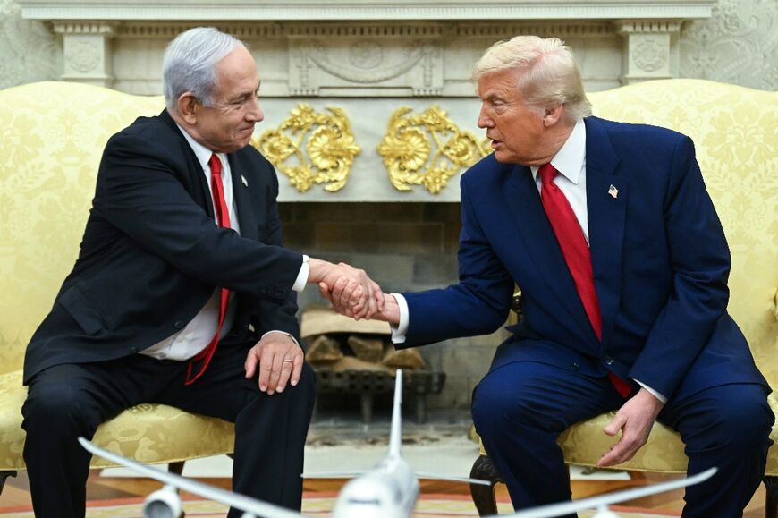 US President Donald Trump shakes hands with Israeli Prime Minister Benjamin Netanyahu during a meeting in the Oval Office of the White House in Washington, DC, on April 7, 2025. Israeli Prime Minister Benjamin Netanyahu was in Washington on Monday to meet Donald Trump, whom he will likely ask for a reprieve from US tariffs while seeking further backing on Iran and Gaza.