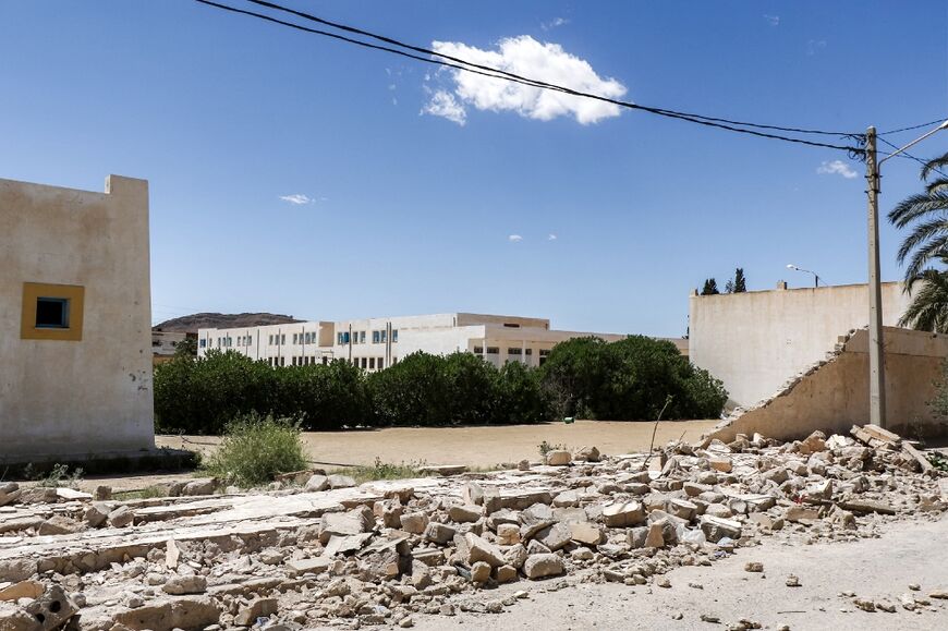 Residents of Mezzouna say it took first responders too long to reach the town after the school wall collapsed, crushing three young adults.