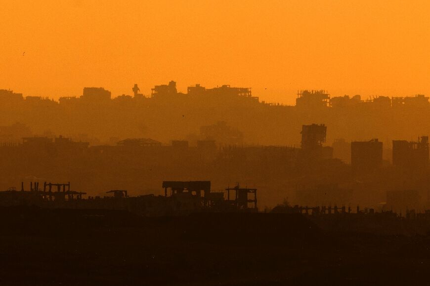 A picture taken from Israeli border with the Gaza Strip shows destruction from Israeli bombardment