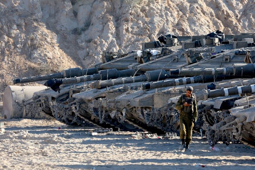 Israeli tanks take up positions on the Gaza border
