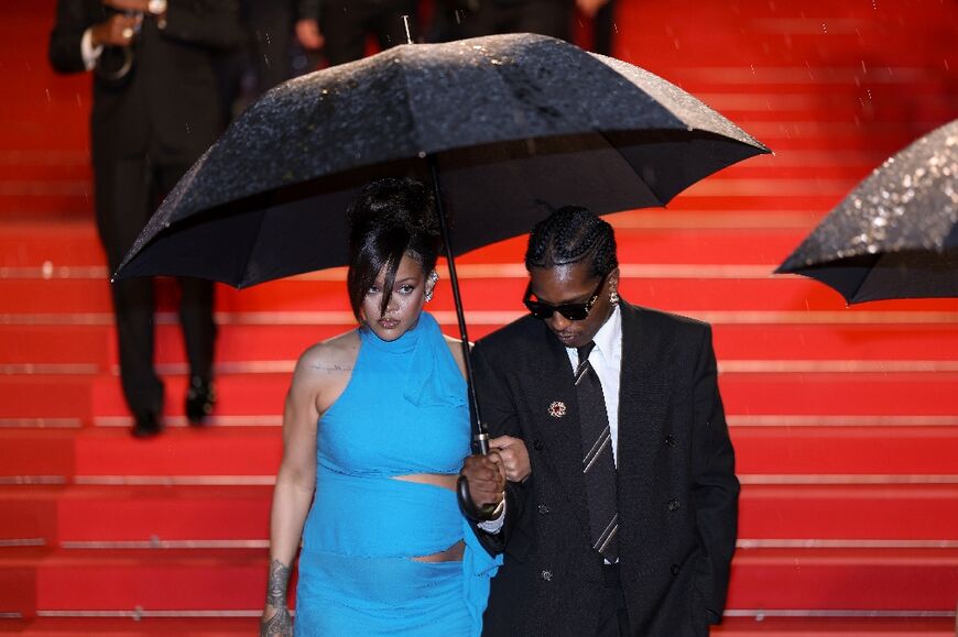 Rihanna and Asap Rocky leave after the screening of the film "Highest 2 Lowest" 
