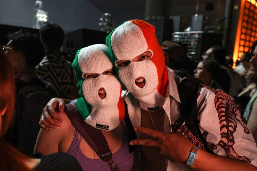Fans of Irish hip hop trio Kneecap wait for the band to perform at the Coachella Festival in California