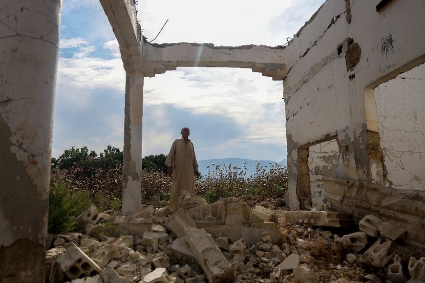 Abdel Ghafour al-Khatib, 72, in his destroyed house: 'Living in my village is the important thing'