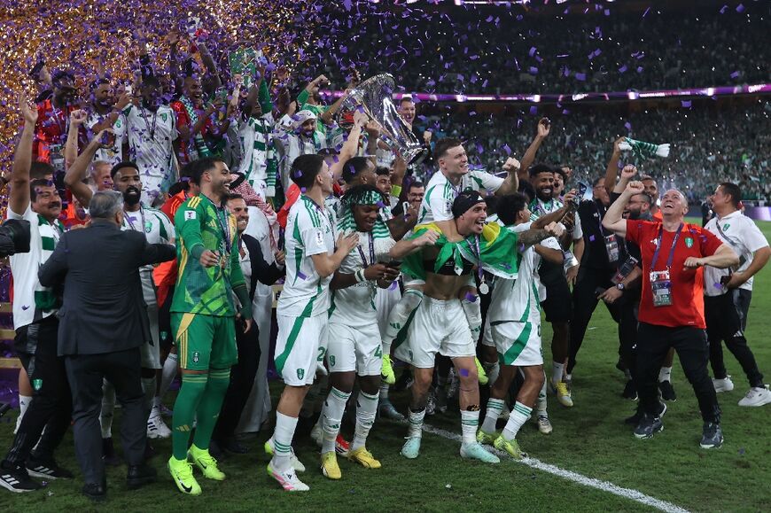 Al Ahli's players celebrate wining the AFC Champions League