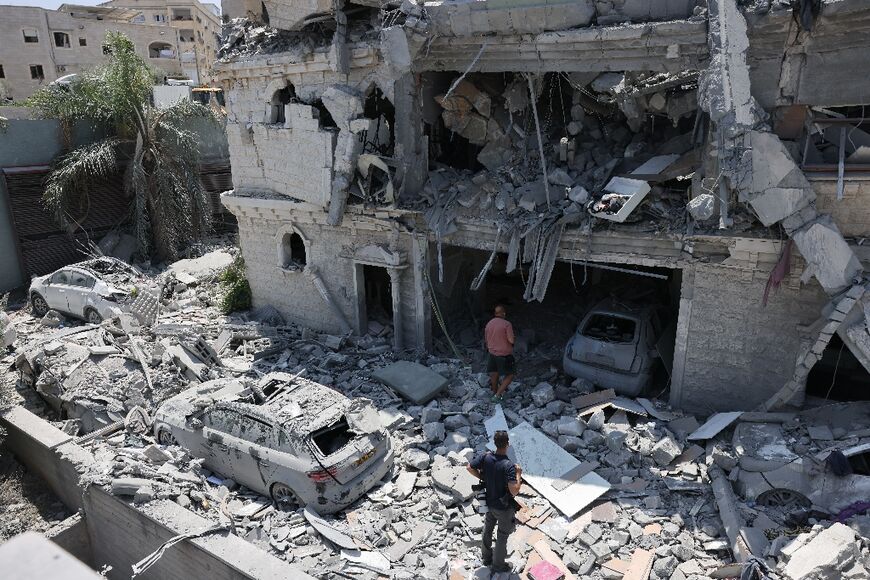 Ther damaged building in Tamra following the missile strike on June 15
