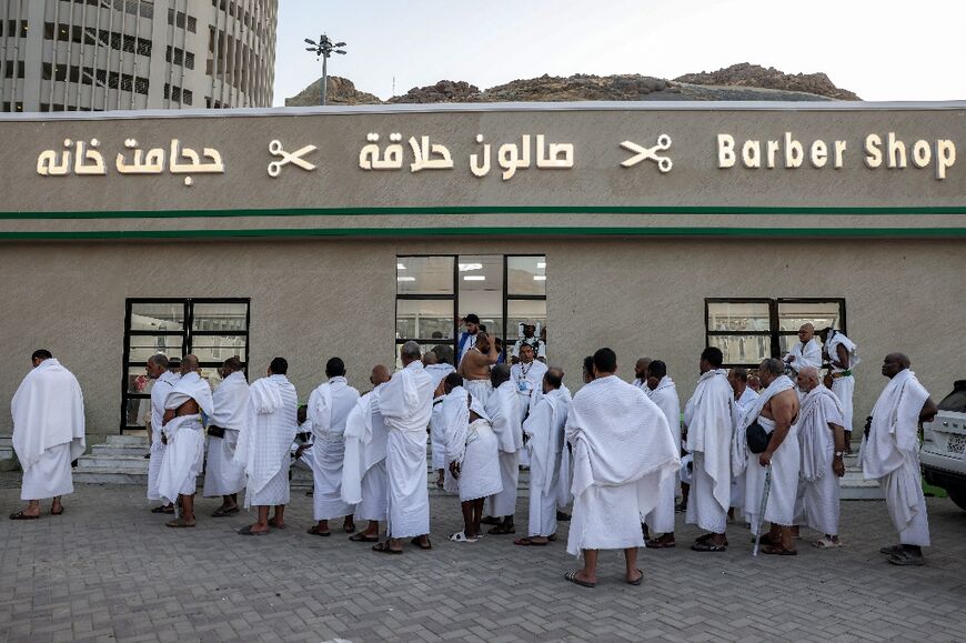 In Mecca, entire streets are lined with barbershops doing brisk business
