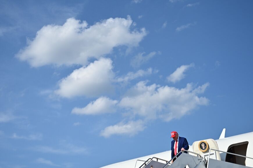 US President Donald Trump steps off Air Force One at Joint Base Andrews in Maryland on June 21, 2025 upon return from his golf club in Bedminster, New Jersey.