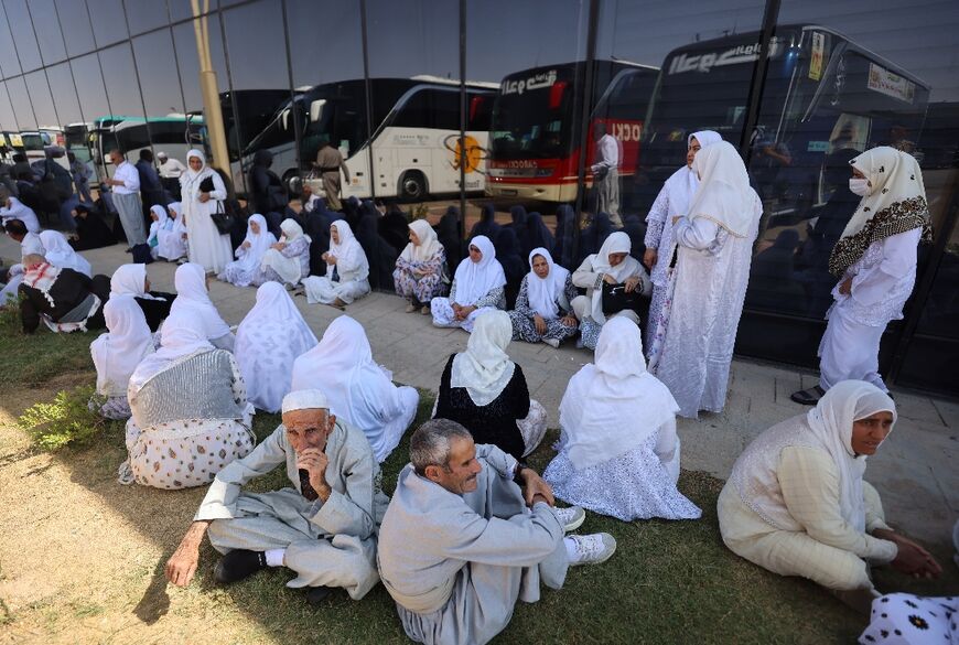 Iranian pilgrims wait in Iraq for the green light to travel to the Mehran border crossing to go home
