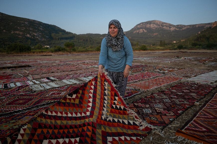 During a three-month drying season some 15,000 carpets are stored side by side on a 40-hectare (100 acre) area