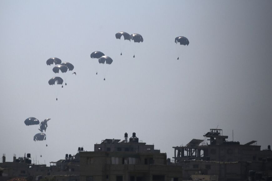 Miltary transport planes from Jordan and the the United Arab Emirates have begun to drop food pallets into Gaza, but the bulk of the aid effort will have to be carried by trucks