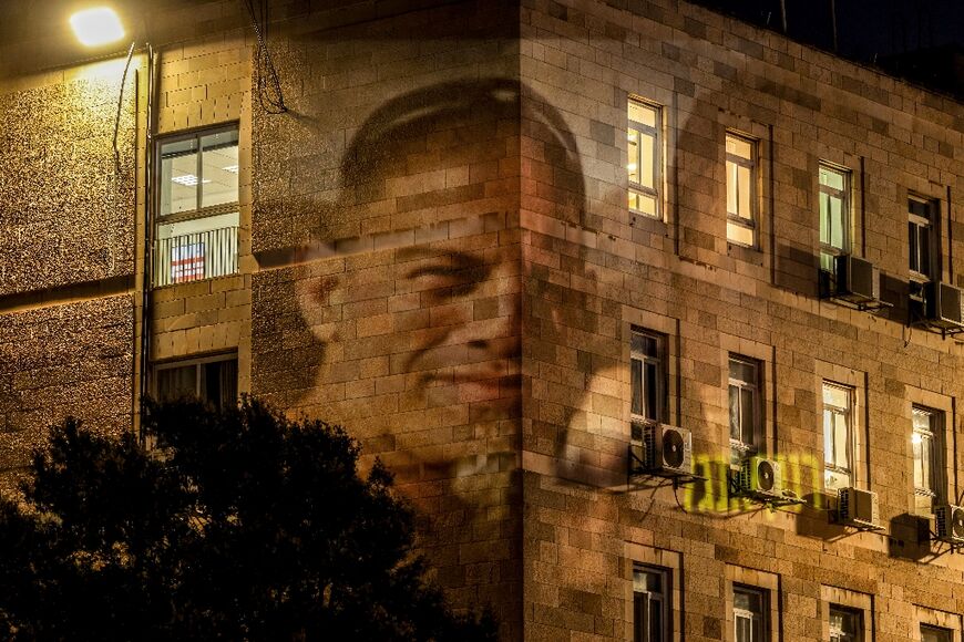 Images of hostages still being held were beamed onto buildings in Jerusalem on Sunday