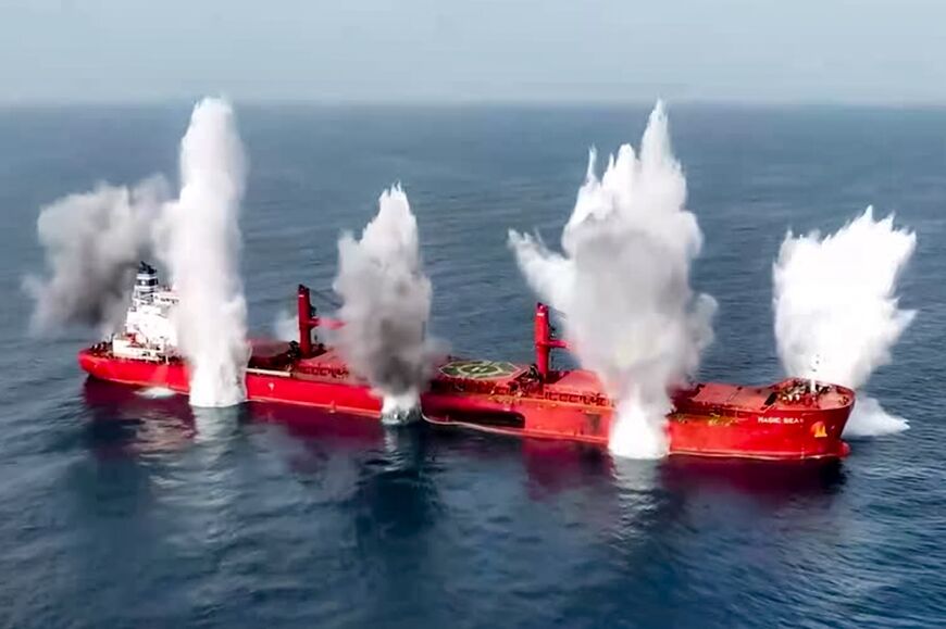 This picture released by Yemen's Huthi rebels shows explosives being detonated aboard the Liberian-flagged bulk carrier Magic Seas on Sunday during their first attack on Red Sea shipping this year.