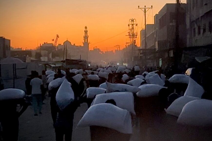 The scramble for what food aid gets in has been deadly, with huge crowds and crushes at aid points and around convoys