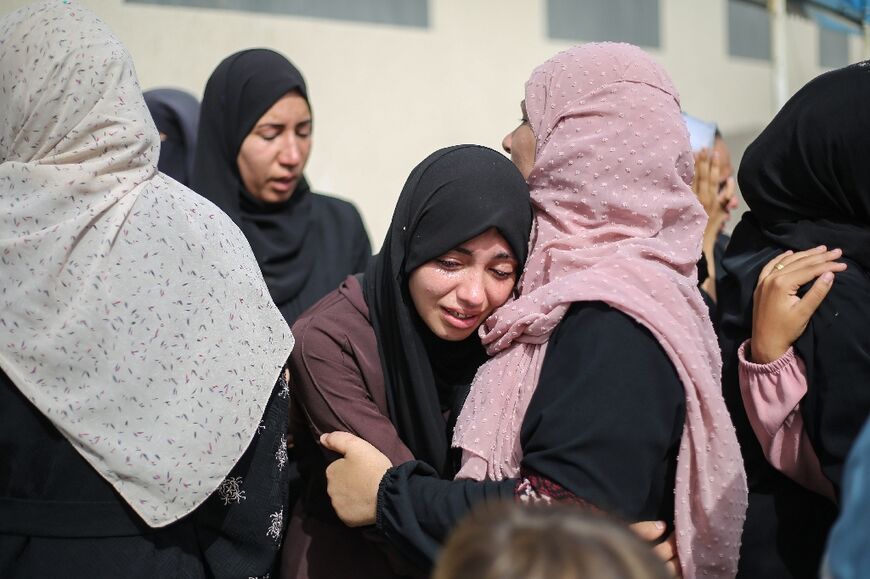 Palestinians mourned relatives at the Al-Aqsa hospital in Deir el-Balah, central Gaza