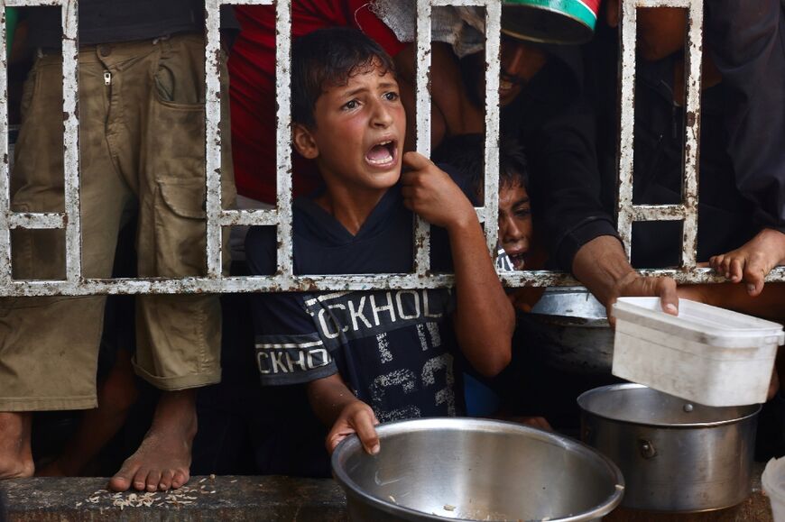 AFP journalists say the difficulties in obtaining enough food to support their families has become an unbearable burden