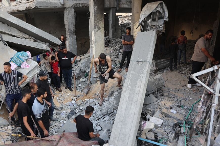 People dug through the rubble in the search for survivors