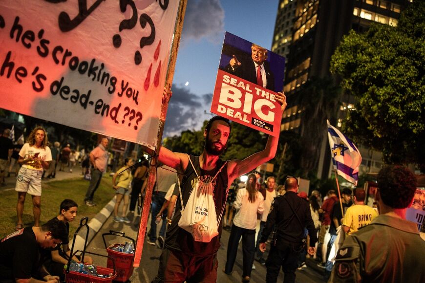 Protesters demanding an end to the Gaza war and a hostage release deal rally in Israel's Tel Aviv city