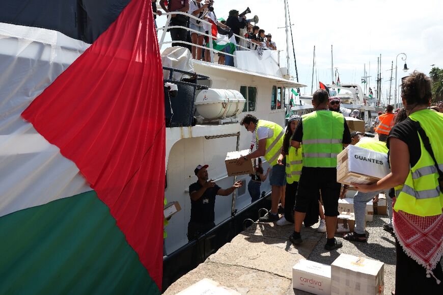 Activists loading the boats up with goods prior to departure