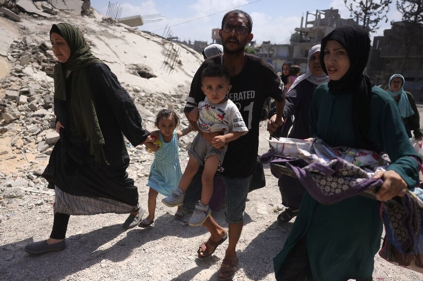 Palestinians flee Jabalia in the northern Gaza Strip as Israeli preparations to seize Gaza City intensify.