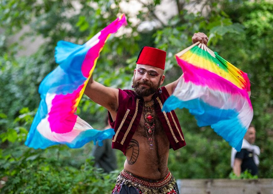 Male Syrian belly dancer 'The Darvish' performs at a festival in a Berlin school
