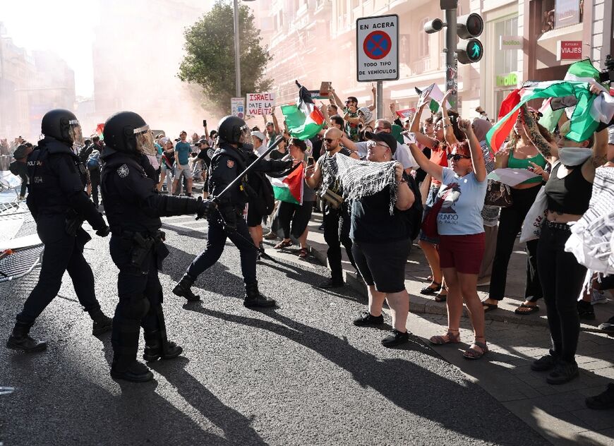 Police clash with pro-Palestinian protestors in Madrid on September 14, 2025