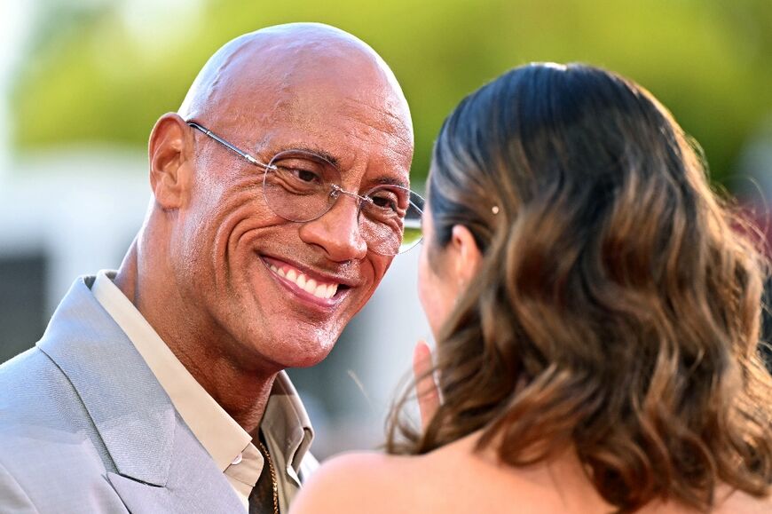 British actress Emily Blunt and US actor Dwayne Johnson play in "The Smashing Machine" which clinched the third-prize Bronze Lion 