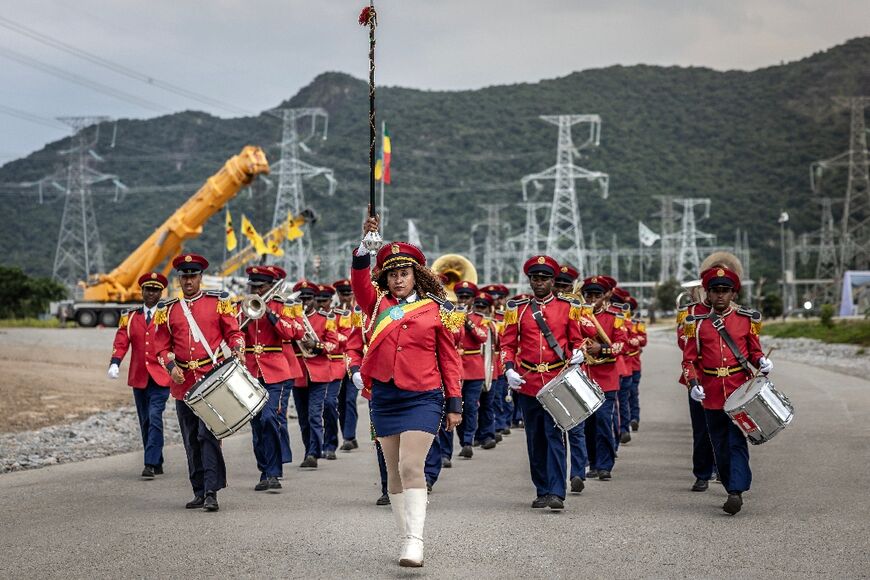 A band performed ahead of the dam's inauguration in Guba