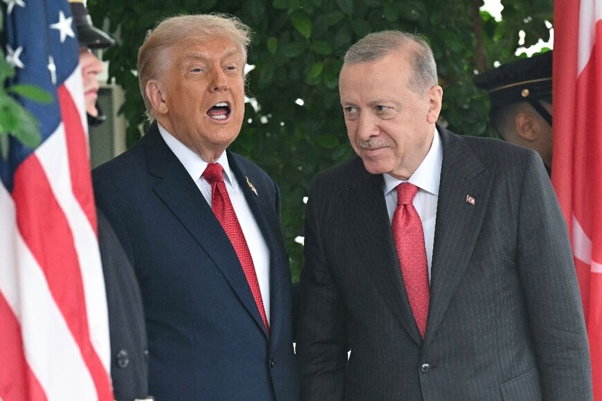 US President Donald Trump greets Turkey's President Recep Tayyip Erdogan as Erdogan arrives at the White House in Washington, DC on September 25, 2025.