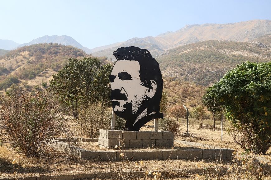 A cutout portrait of jailed PKK leader Abdullah Ocalan at the site in northern Iraq where the group announced a withdrawal of its fighters from Turkey 