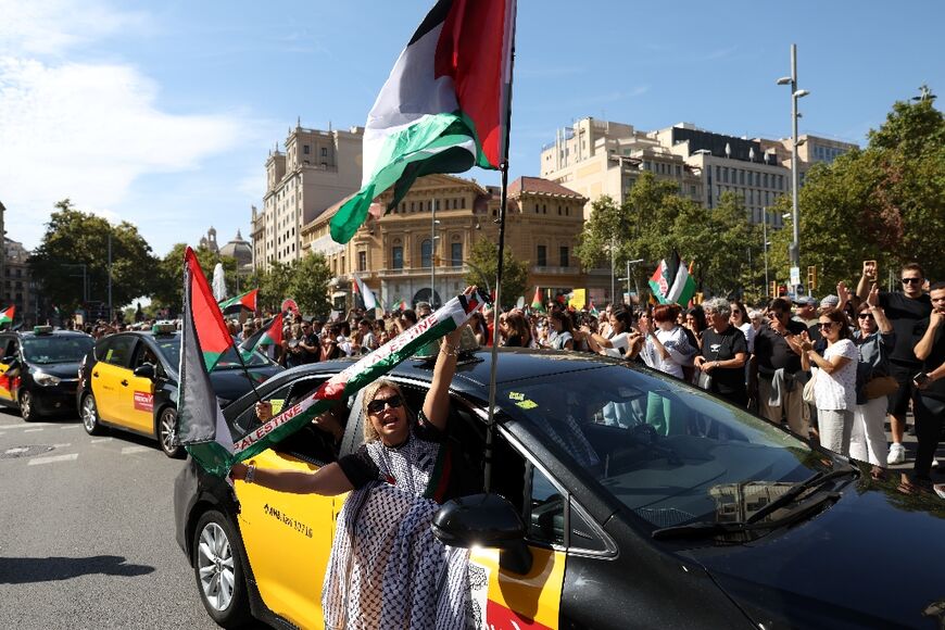 Tens of thousands rally in Barcelona behind a banner reading 'Stop the genocide in Palestine'