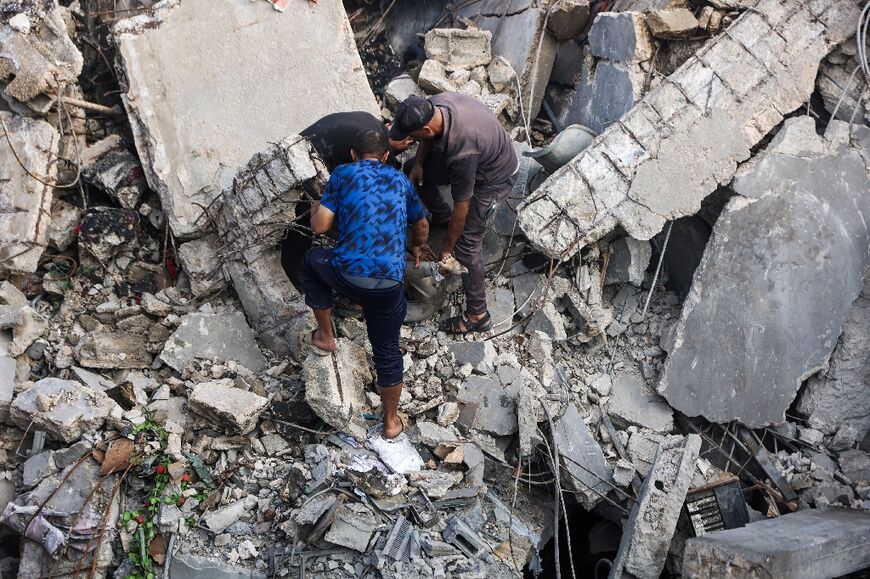 Thousands of bodies are thought to be buried under the rubble